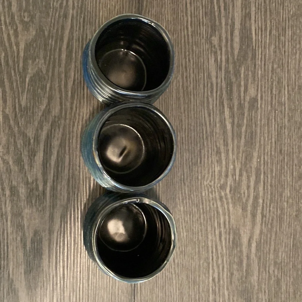 Decorative  clay, metallic blue container. 3 combined vases/cups.